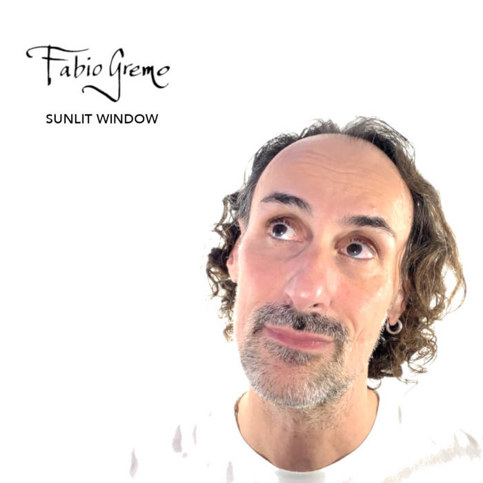 fabio gremo - sunlit window